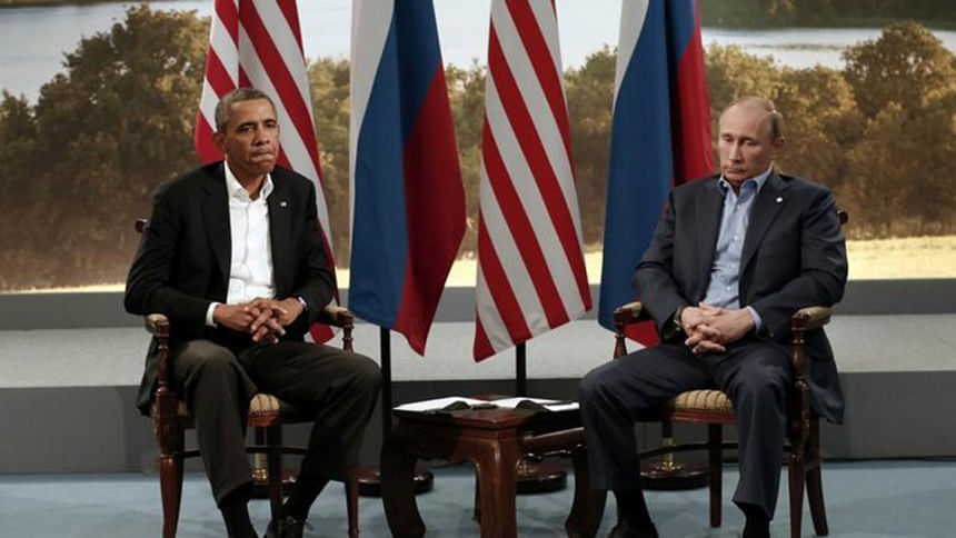 US President Barack Obama (L) meets with Russian President Vladimir Putin US President Barack Obama (L) meets with Russian President Vladimir Putin