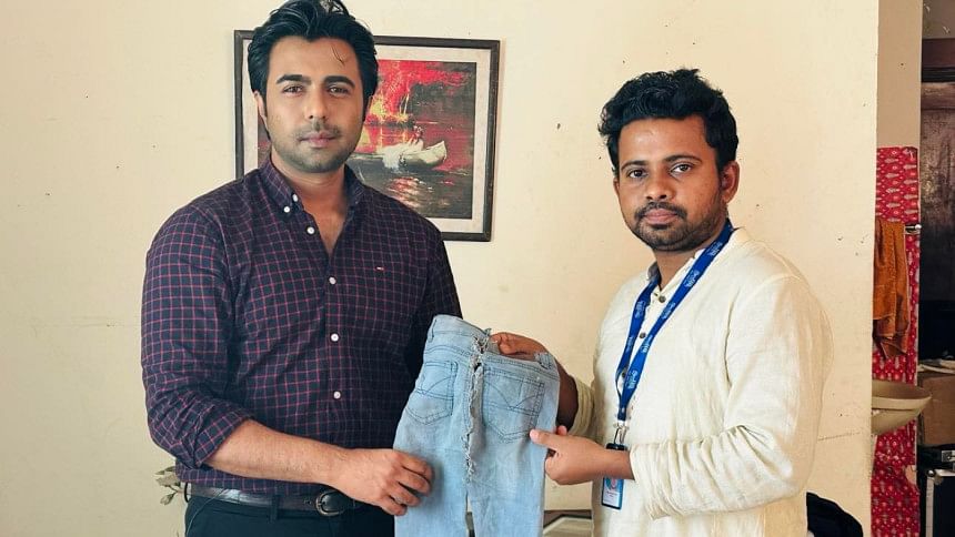 Apurba buys burnt jeans for BDT 1 lakh to support Bangabazar fire victims Apurba buys burnt jeans for BDT 1 lakh to support Bangabazar fire victims