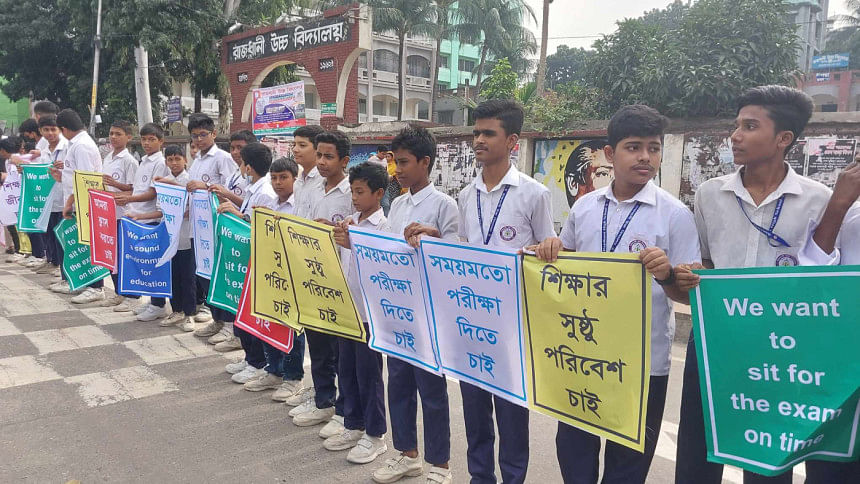 Students, teachers form human chains demanding timely exams, safe environment