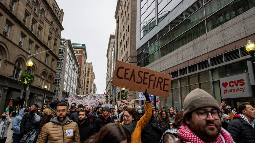 Demonstrators take part in a march in support of Palestinians in Boston