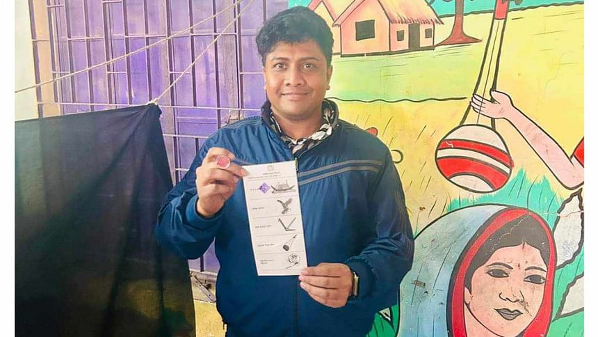 DU BCL president poses with ballot paper with vote for boat DU BCL President Poses with Boat Symbol on Ballot