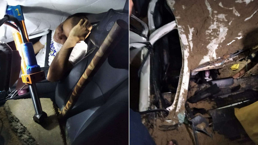 Man escapes death after truck falls on his car at Bijoy Sarani Man escapes death after truck falls on his car at Bijoy Sarani
