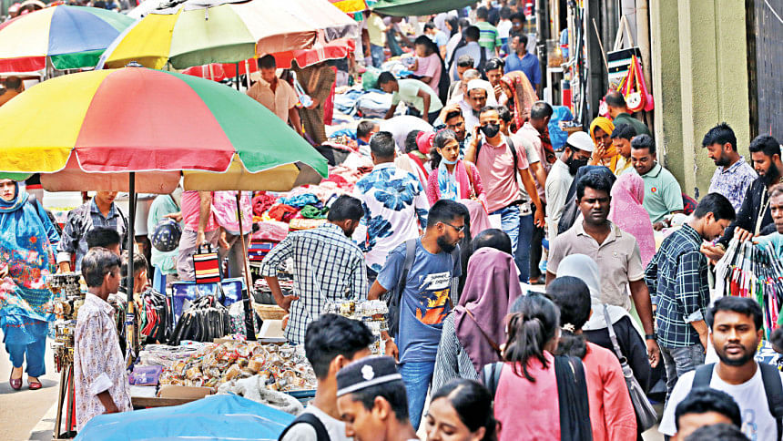 Dhaka footpaths, a money-spinner for extortionists illegal footpath occupation in Dhaka