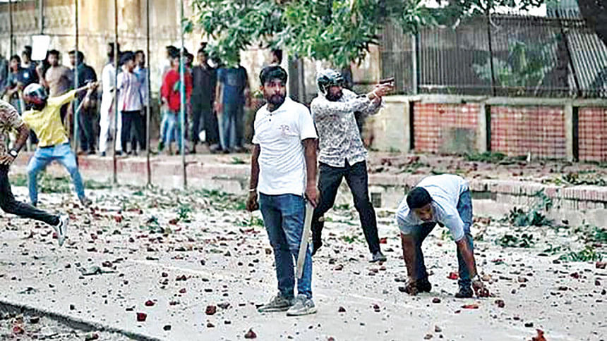 BCL attack on quota reform protesters BCL attack on quota reform protesters: A man brandishes a gun towards the protesters in the Shahidullah Hall area.