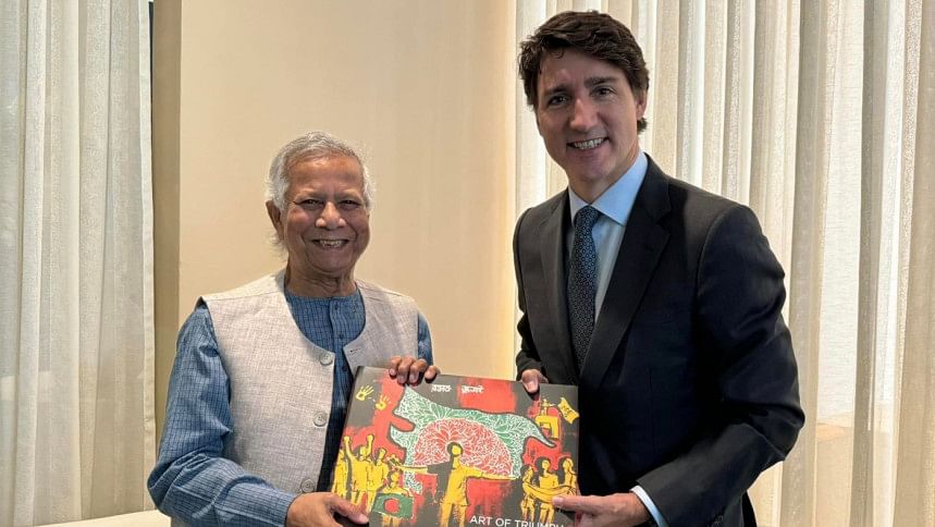 Yunus gifts The Art of Triumph to Trudeau Yunus gifts The Art of Triumph to Trudeau