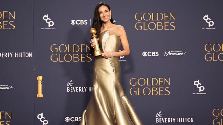 Demi Moore wins her first Golden Globe award Demi Moore wins her first Golden Globe award