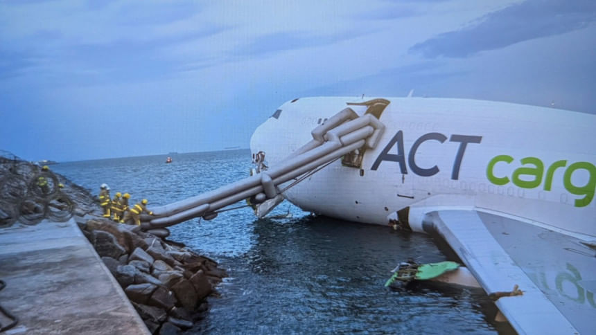 Two killed as cargo plane skids off Hong Kong runway