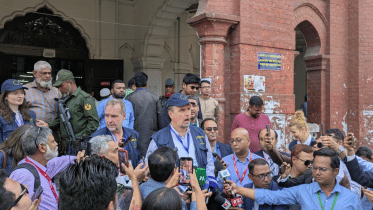 Ivars Ijabs is speaking to reporters after visiting Dhaka University’s Curzon Hall polling centre. Photo: Star