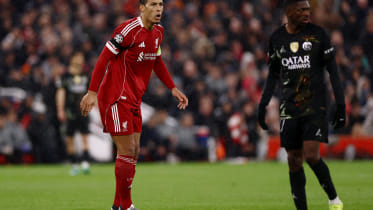 2026-04-14T193929Z_2107818570_UP1EM4E1ILRYF_RTRMADP_3_SOCCER-CHAMPIONS-LIV-PSG.JPG