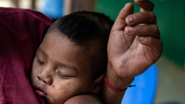 Child rests in sindukpara. Photo by Orchid Chakma 