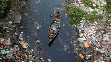 collects-plastic-dirty-water-Dhaka.jpg