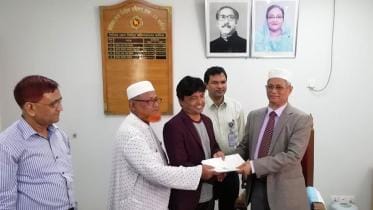 AKM Mizanur Rahman on behalf of Atiqul Islam collects nomination form