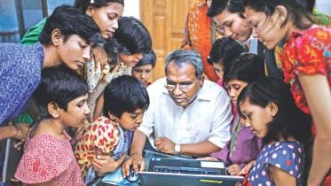 Dr Ehsan Hoque with underprivileged and orphaned children