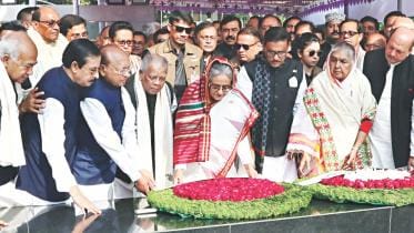 Hasina places wreath.jpg