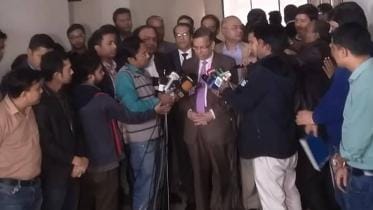 Law Minister Anisul Huq talks to reporters after attending the inauguration