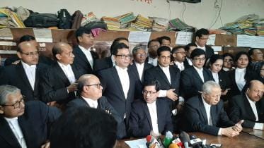 Attorney General Mahbubey Alam talks during a briefing 