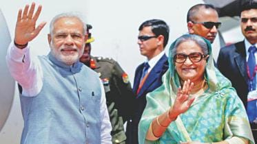 Prime Minister Sheikh Hasina welcoming Indian Prime Minister Narendra Modi to Bangladesh