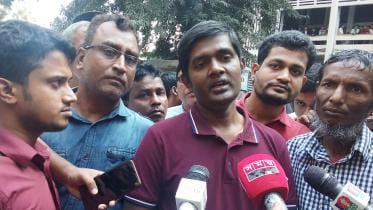 DB assistant commissioner Rabiul Karim's brother talking to reporters