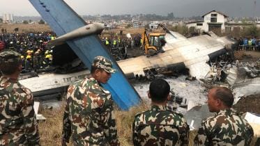 US-Bangla Airlines plane crash photos