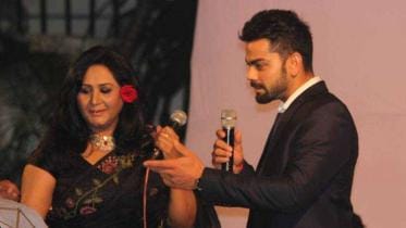 virat-kohli-singing-dhaka-1WB.jpg
