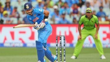 Virat Kohli scores fifty.jpg