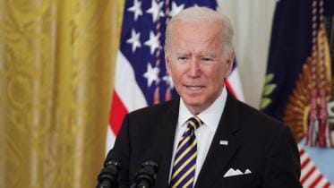 biden vows not to bow down to russia