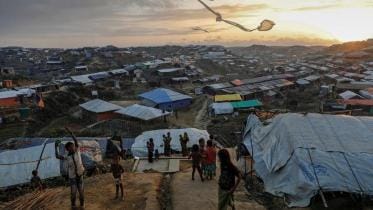 rohingya_refugee_children_fly_improvised_kites_at_the_kutupalong_refugee_camp_near_coxs_bazar_bangladesh_december_10_2017._reuters_damir_sagolj.jpg