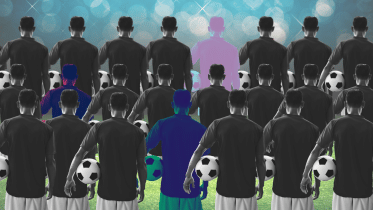 Rows of football players facing the field.