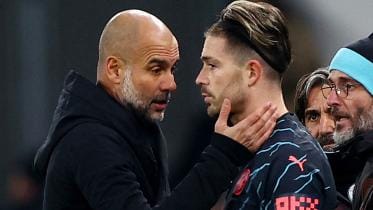 Jack Grealish, Pep Guardiola.jpg