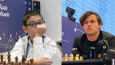 Faustino Oro, Magnus Carlsen.jpg