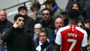 Mikel Arteta and Saka 