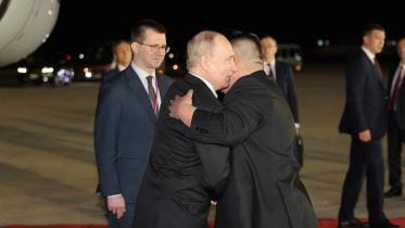 putin_embraces_north_korean_leader_kim_jong_un.jpg