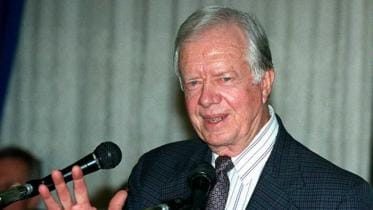 jimmy_carter_speaks_to_reporters.jpg