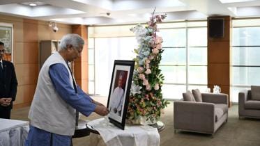 Yunus pays homage to Manmohan Singh
