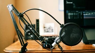 The role of video podcasts: Bridging global and local narratives       austin-distel-vcfxt2yt1eq-unsplash_5.jpg