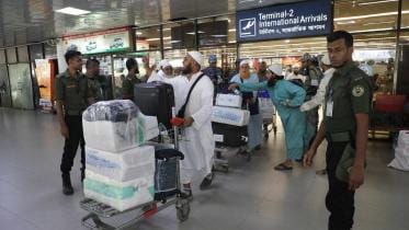 hajj return flight lands at Dhaka