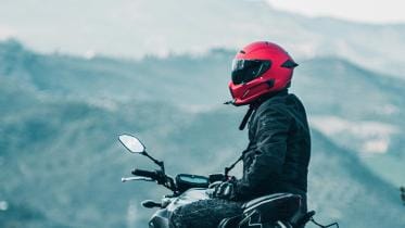 Biker with helmet