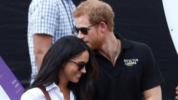 Britains Prince Harry arrives with girlfriend Meghan Markle Britains Prince Harry arrives with girlfriend Meghan Markle
