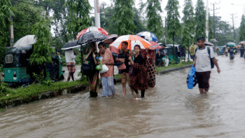 People looking for shelter in the flood, photo taken in Akhalia area of Sylhet