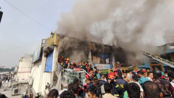 new market fire Defence forces join 30 fire service units to fight New Super Market blaze