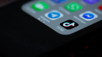 TikTok logo on phone TikTok logo on phone