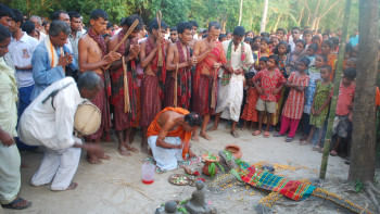 Locals perform the ritual of Charak Puja Locals perform the ritual of Charak Puja