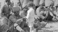A French boy introduces himself to Indian soldiers. Marseilles, 30th September 1914..png