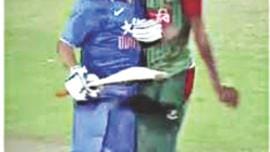dhoni collide mustafiz.jpg