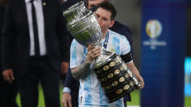 messi_with_trophy.jpg