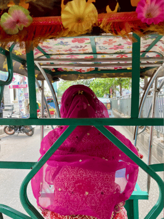 This brave mother takes the wheel on the roads of Dhaka