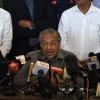 Malaysian ex-leader Mahathir Mohamad meets with king Malaysian ex-leader Mahathir Mohamad meets with king