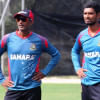 Mahmudullah and Ruwan Kalpage watch during Bangladesh practice Mahmudullah and Ruwan Kalpage during training