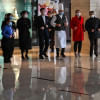 Hotel workers wearing protective masks exercise in the lobby  Hotel workers wearing protective masks exercise in the lobby