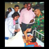 Dr. Tahmina Banu attending to a young patient at CMCH.  Dr. Tahmina Banu attending to a young patient at CMCH.